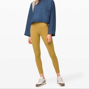Lululemon Aligns in grapeleaf (mustard yellow)